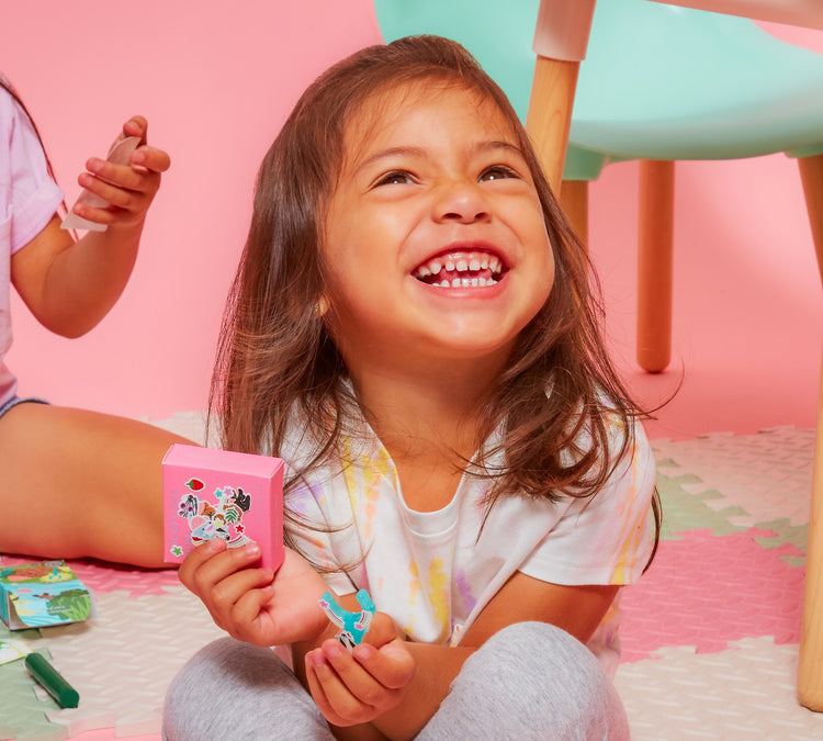 toddler holding Cocoflosser